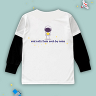 White kids Christian tshirt with black long sleeve undershirt decorated with an astronaut holding a star with the words "and calls them each by name" among stars beneath it. 